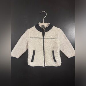 12-18m Old Navy jacket. Blue w/soft white exterior. Very comfy. Great condition!